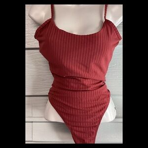 Burgundy, one piece swimsuit.